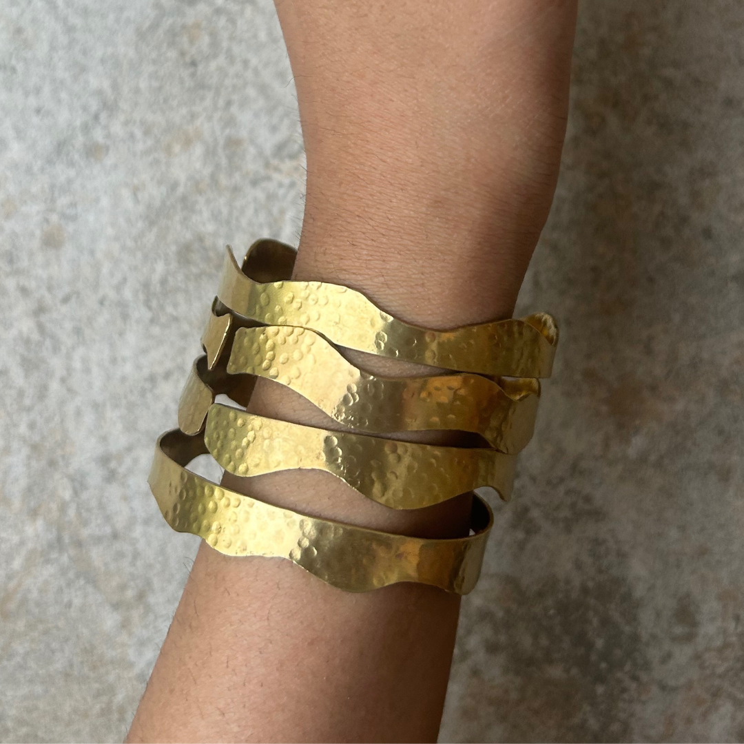 Handmade brass bangles set of 4 with irregular stippling texture – artisanal, wavy design jewelry by JOAS
