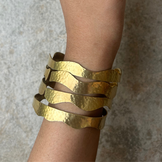 Handmade brass bangles set of 4 with irregular stippling texture – artisanal, wavy design jewelry by JOAS