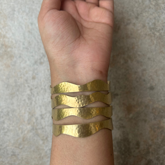 Handmade brass bangles set of 4 with irregular stippling texture – artisanal, wavy design jewelry by JOAS
